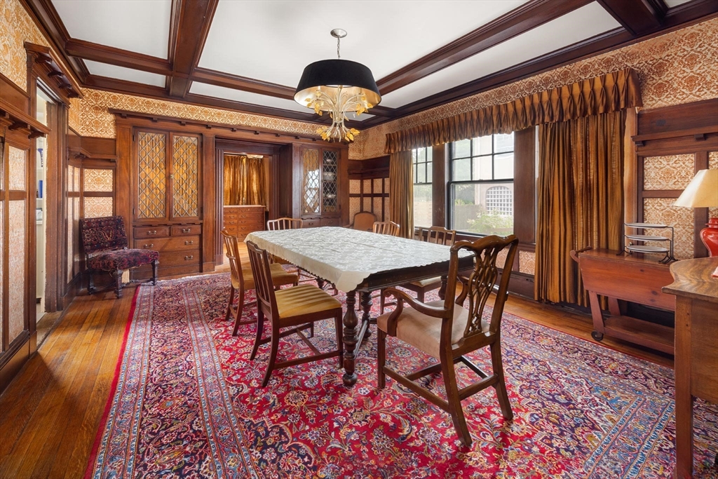 10 Evans Road Brookline, MA 02445 - Photo 3 of 10 a view of a dining room with furniture window and wooden floor