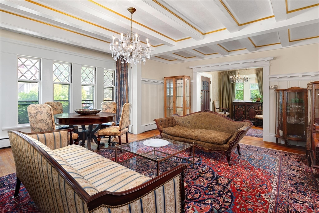 10 Evans Road Brookline, MA 02445 - Photo 6 of 10 a view of a dining room with furniture window and wooden floor