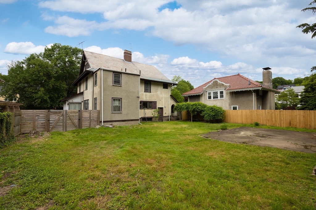 10 Evans Road Brookline, MA 02445 - Photo 9 of 10 a view of a big yard next to a building