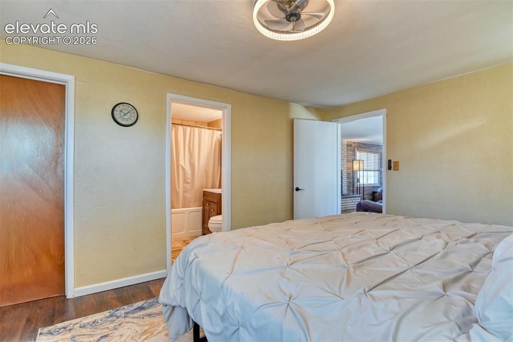 10970 Garrett Road Peyton, CO 80831 - Photo 17 of 50 a bedroom with a bed and a window