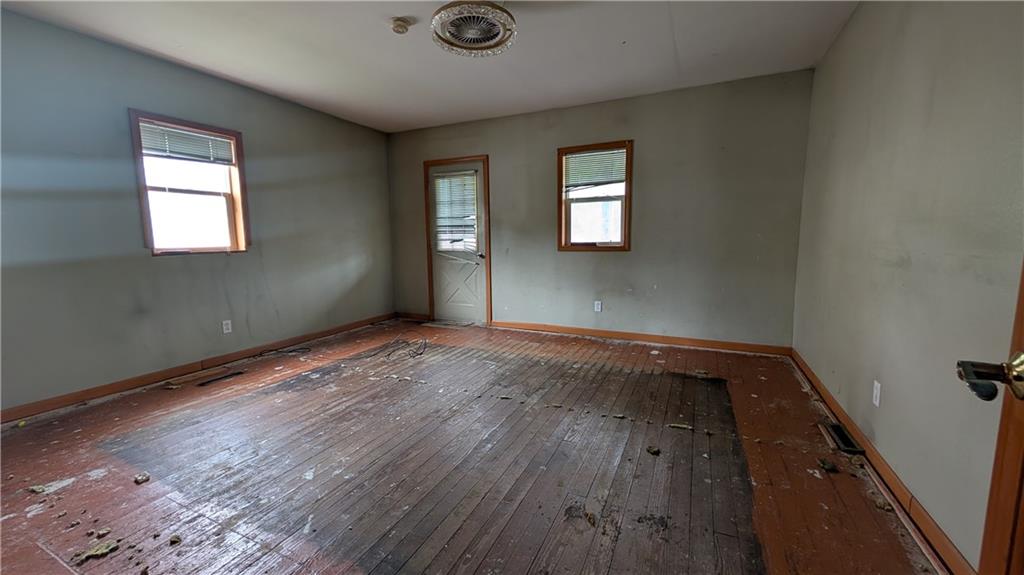 102 Moose Hill Road Millsboro, PA 15348 - Photo 11 of 11 a view of a room with wooden floor and window