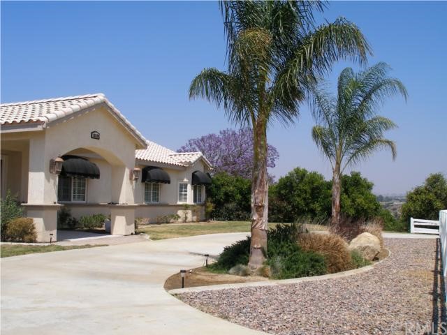 15830 Rawhide Lane Riverside, CA 92504 - Photo 1 of 1 Circular drive to front double-door entry.