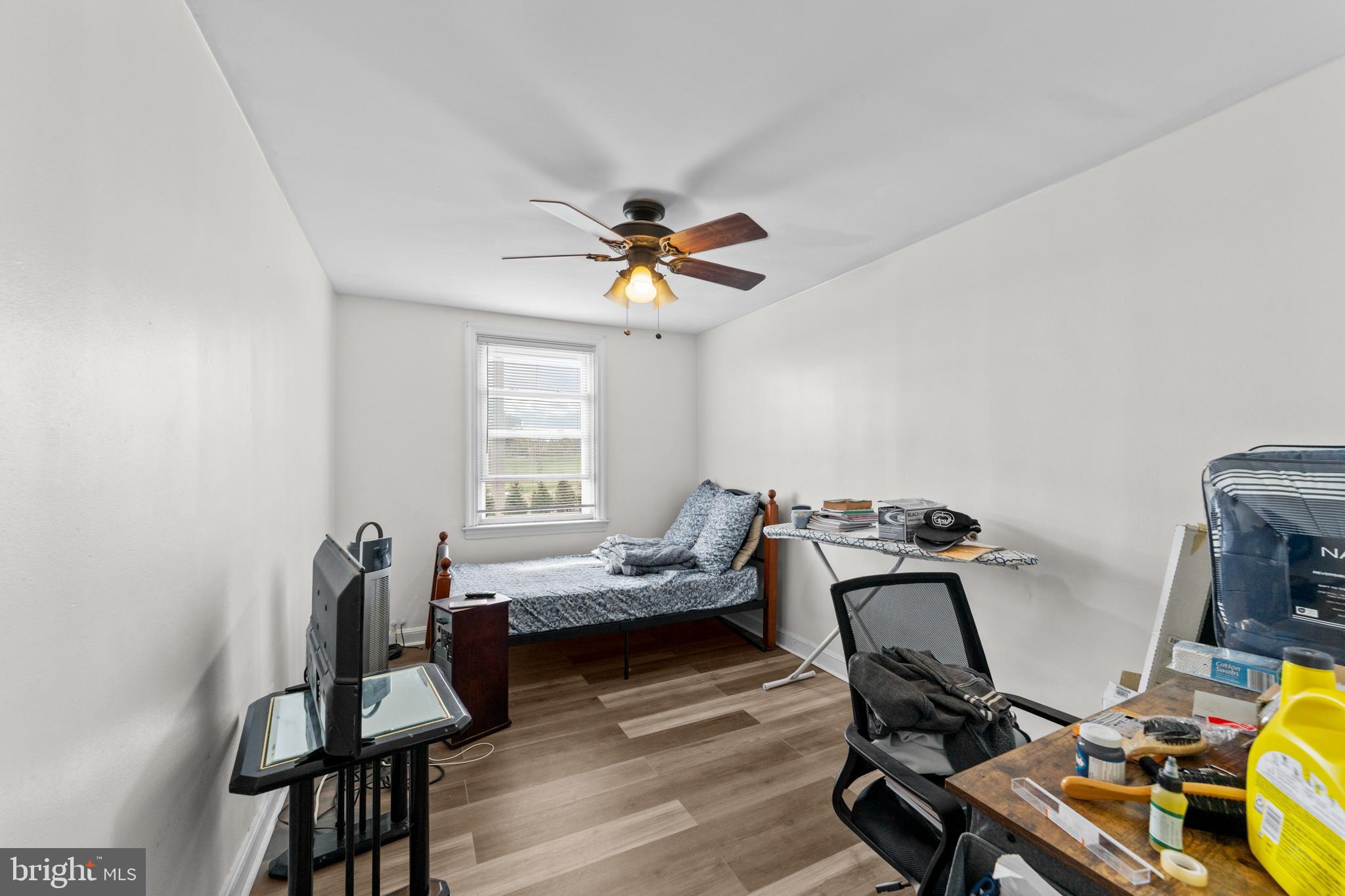 1314 Farrington Road Philadelphia, PA 19151 - Photo 13 of 21 a living room with furniture and a window