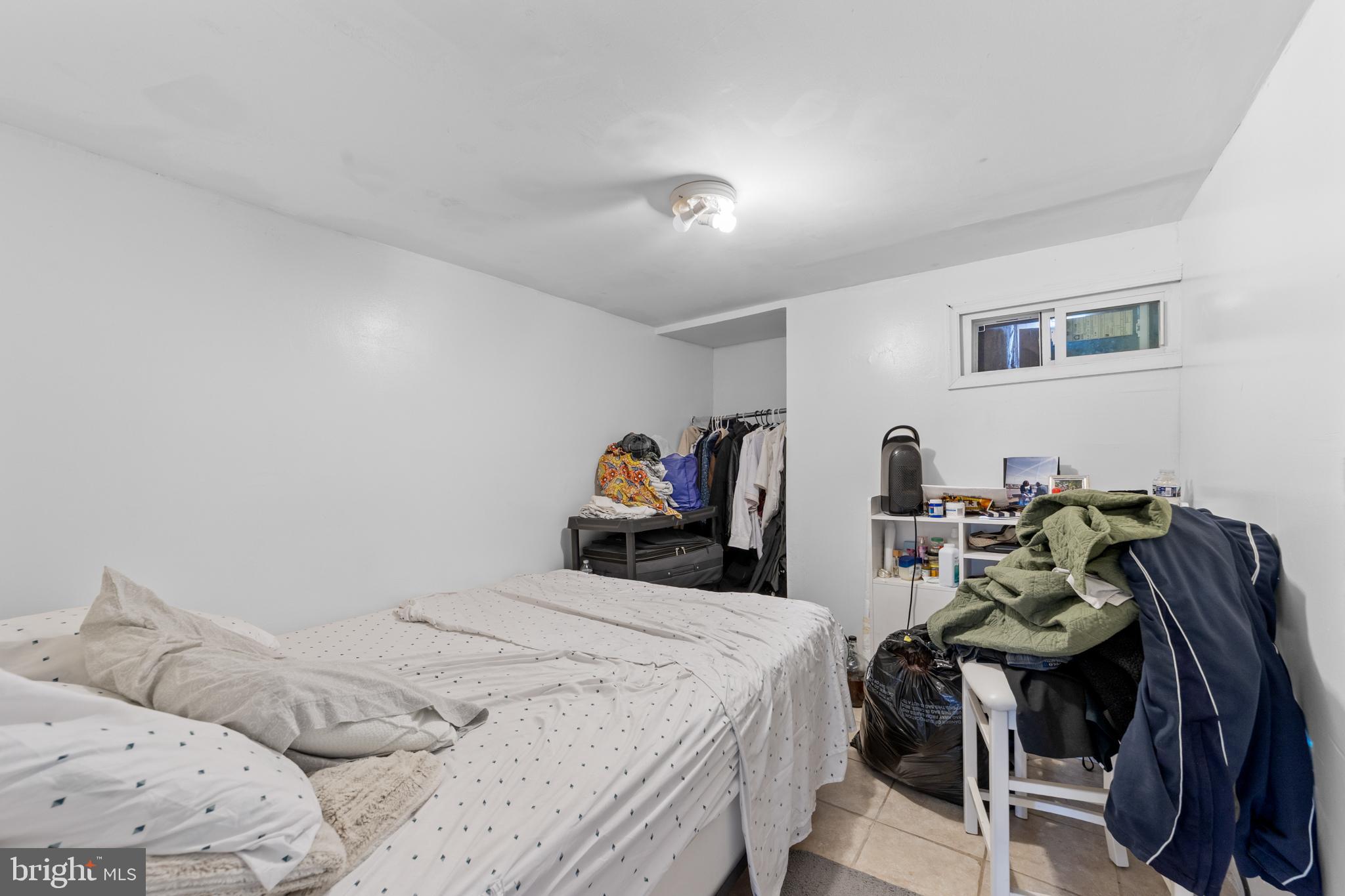 1314 Farrington Road Philadelphia, PA 19151 - Photo 16 of 21 a bedroom with two beds and a desk
