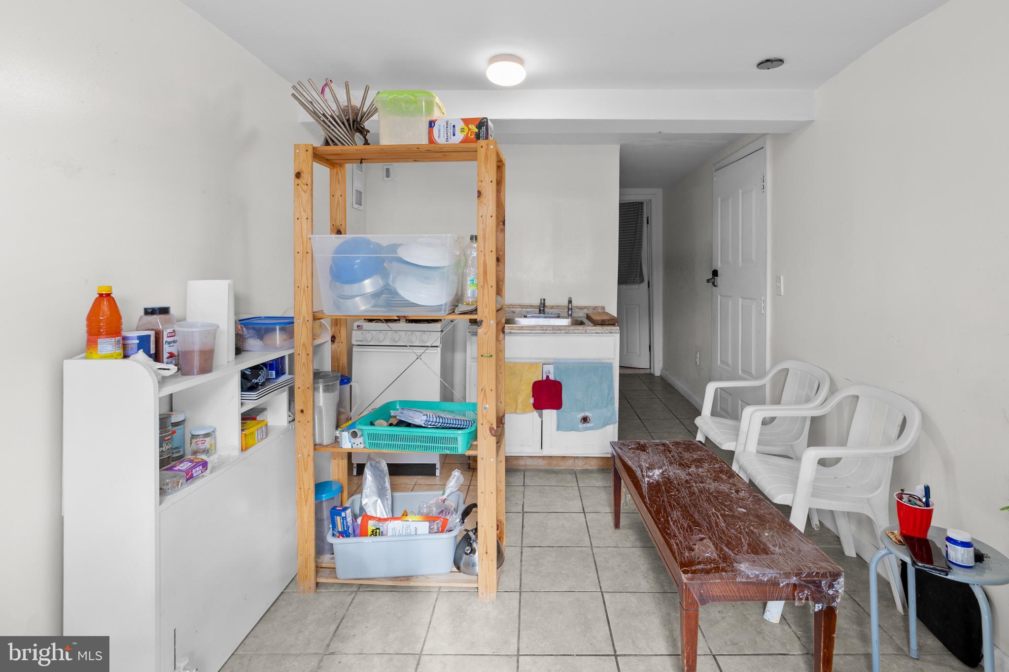 1314 Farrington Road Philadelphia, PA 19151 - Photo 17 of 21 a storage utility room with washer and dryer