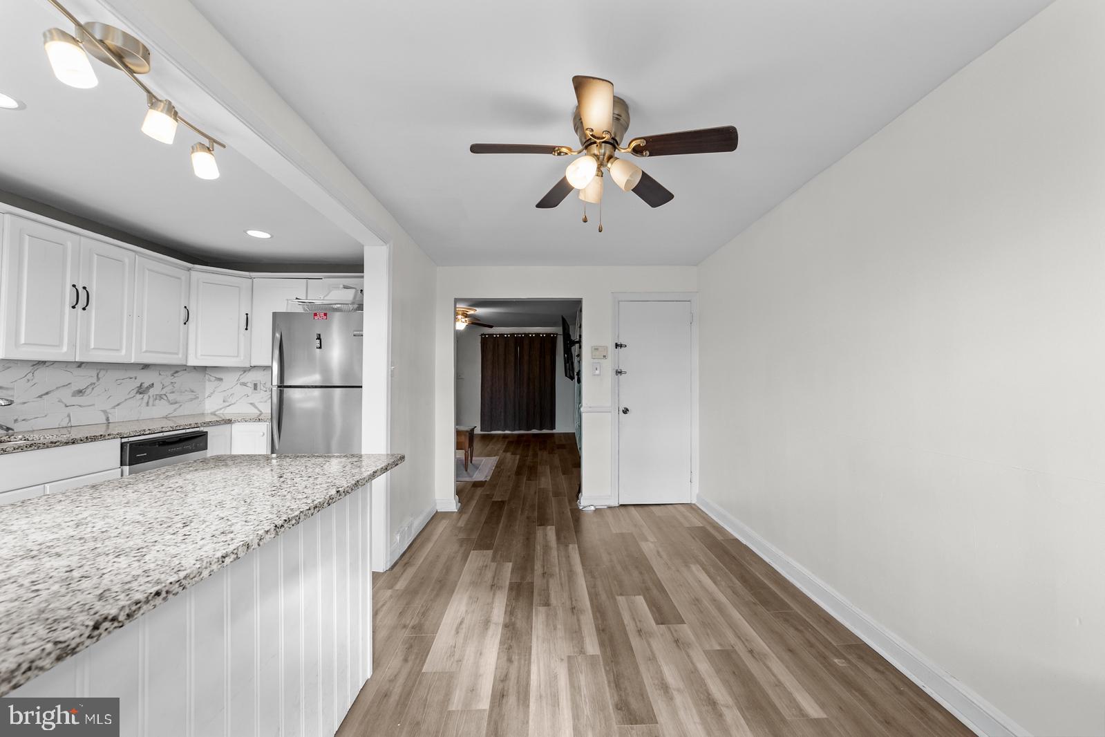 1314 Farrington Road Philadelphia, PA 19151 - Photo 6 of 21 a kitchen with a refrigerator and a sink