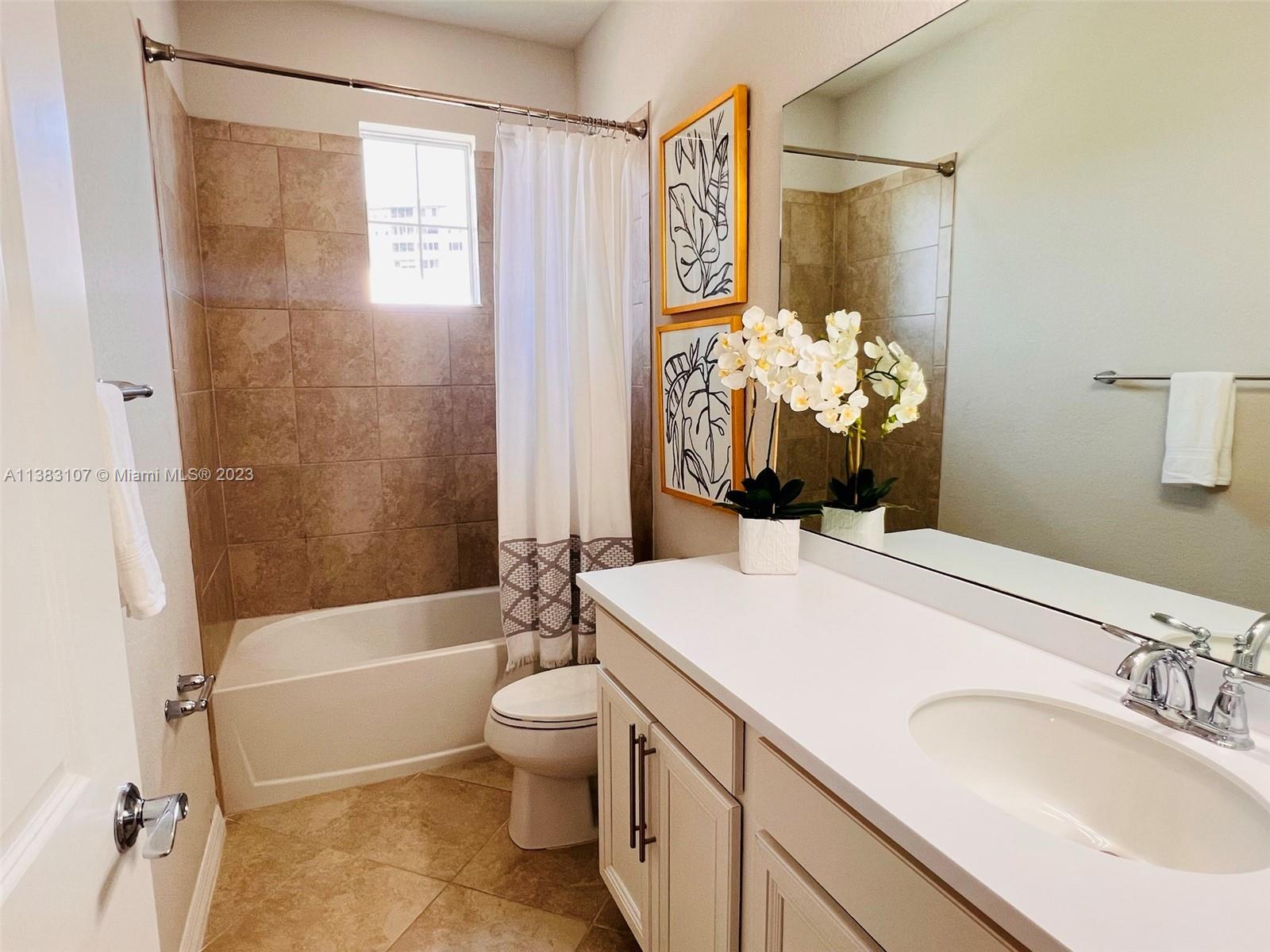 4002 Long Leaf Lane, Unit 6 Hollywood, FL 33021 - Photo 18 of 35 a bathroom with a sink toilet and shower