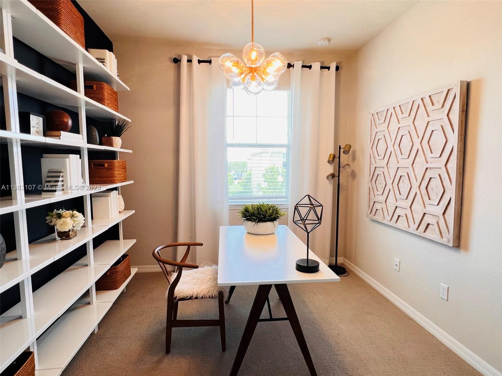 4002 Long Leaf Lane, Unit 6 Hollywood, FL 33021 - Photo 23 of 35 a view of a dining room with furniture window and wooden floor