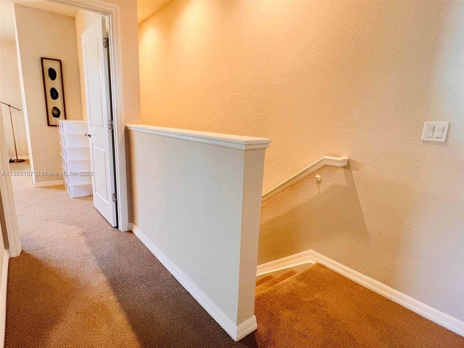 4002 Long Leaf Lane, Unit 6 Hollywood, FL 33021 - Photo 25 of 35 a view of a hallway with a hallway