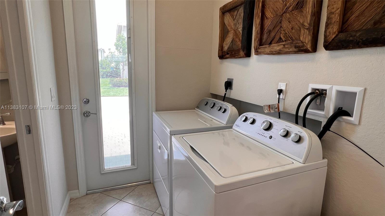 4002 Long Leaf Lane, Unit 6 Hollywood, FL 33021 - Photo 8 of 35 a utility room with dryer and washer