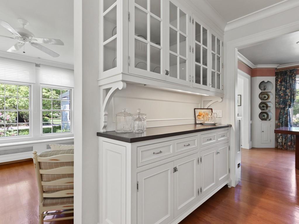 8 Varick Road Newton, MA 02468 - Photo 16 of 42 a kitchen with granite countertop a sink and cabinets