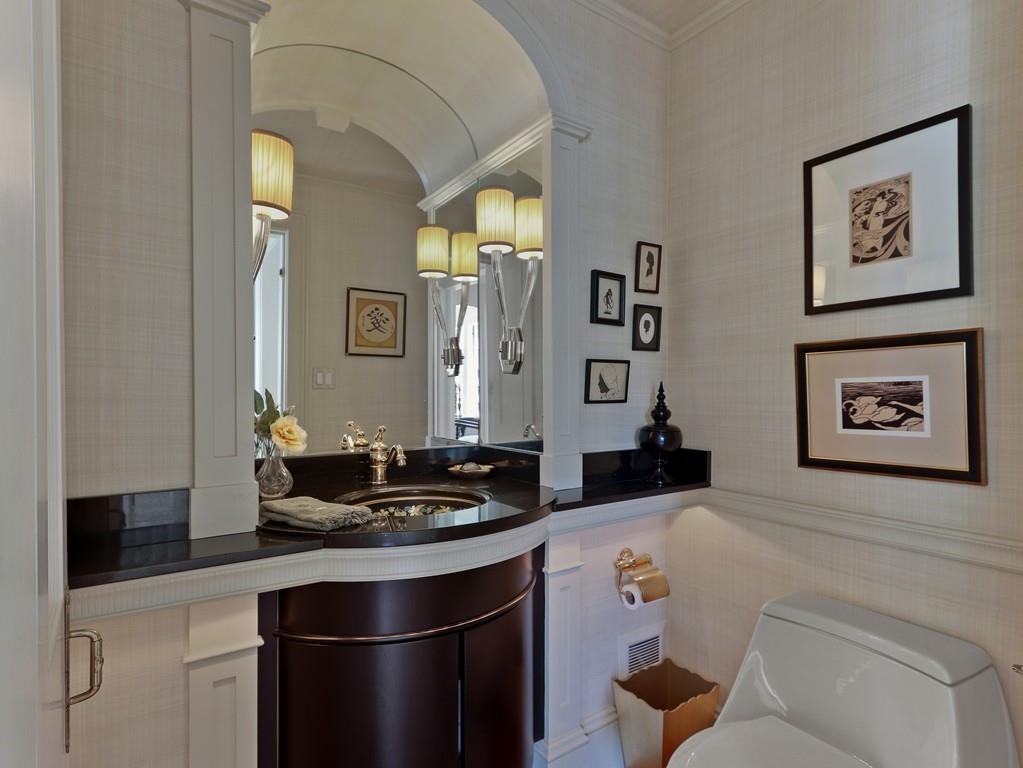 8 Varick Road Newton, MA 02468 - Photo 19 of 42 a bathroom with a sink and a mirror