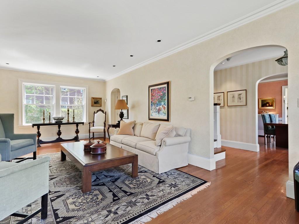 8 Varick Road Newton, MA 02468 - Photo 21 of 42 a living room with furniture a large window and wooden floor