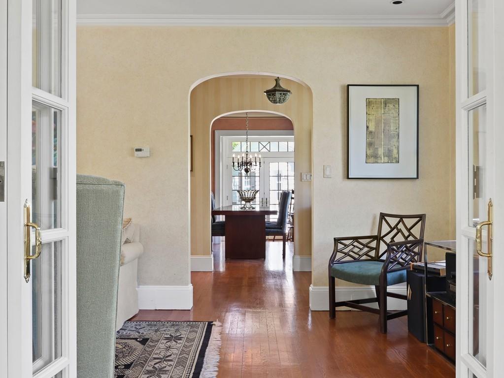 8 Varick Road Newton, MA 02468 - Photo 25 of 42 a view of a livingroom with furniture and wooden floor