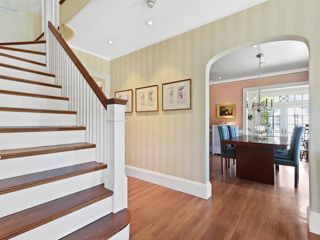 8 Varick Road Newton, MA 02468 - Photo 27 of 42 a view of a livingroom with furniture wooden floor and windows