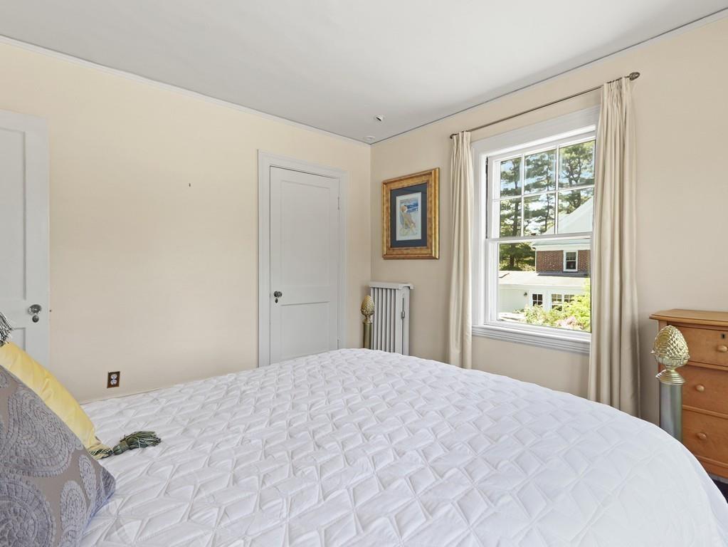 8 Varick Road Newton, MA 02468 - Photo 33 of 42 a bedroom with a bed and a window