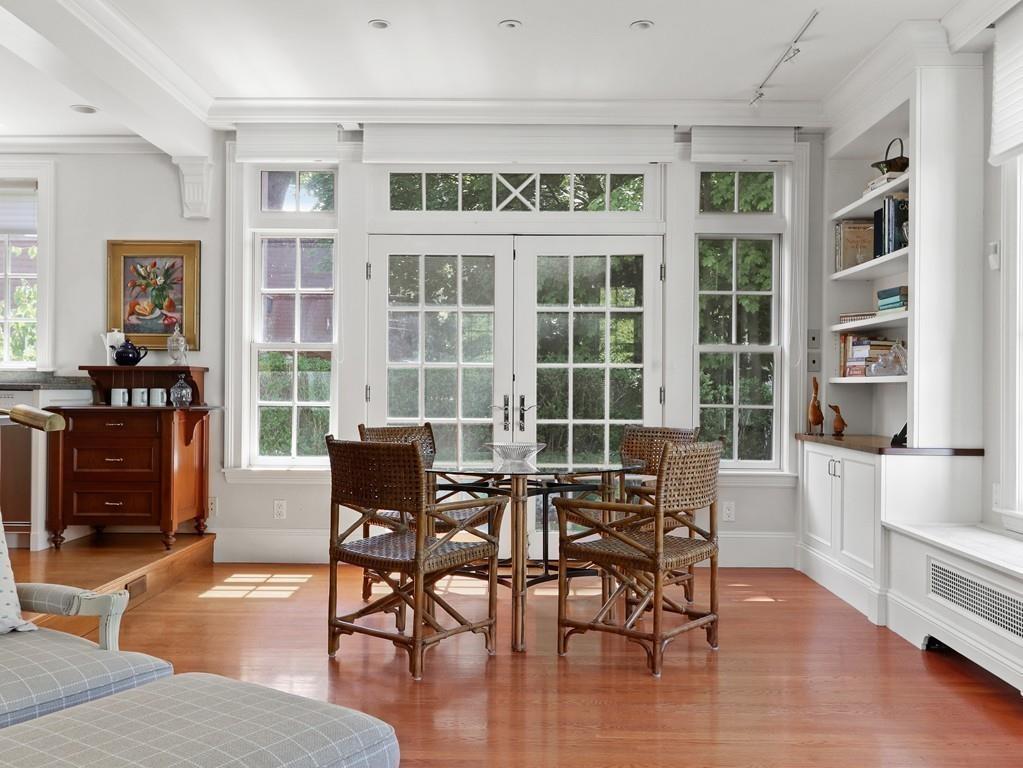 8 Varick Road Newton, MA 02468 - Photo 9 of 42 a dining room with wooden floor and furniture