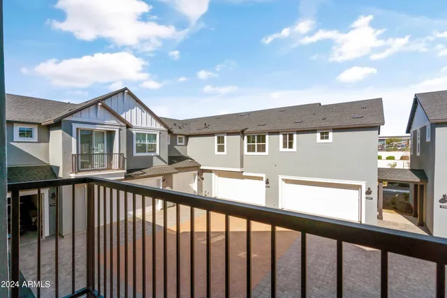 a view of a house with a swimming pool