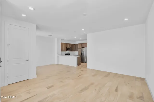 a view of kitchen with wooden floor