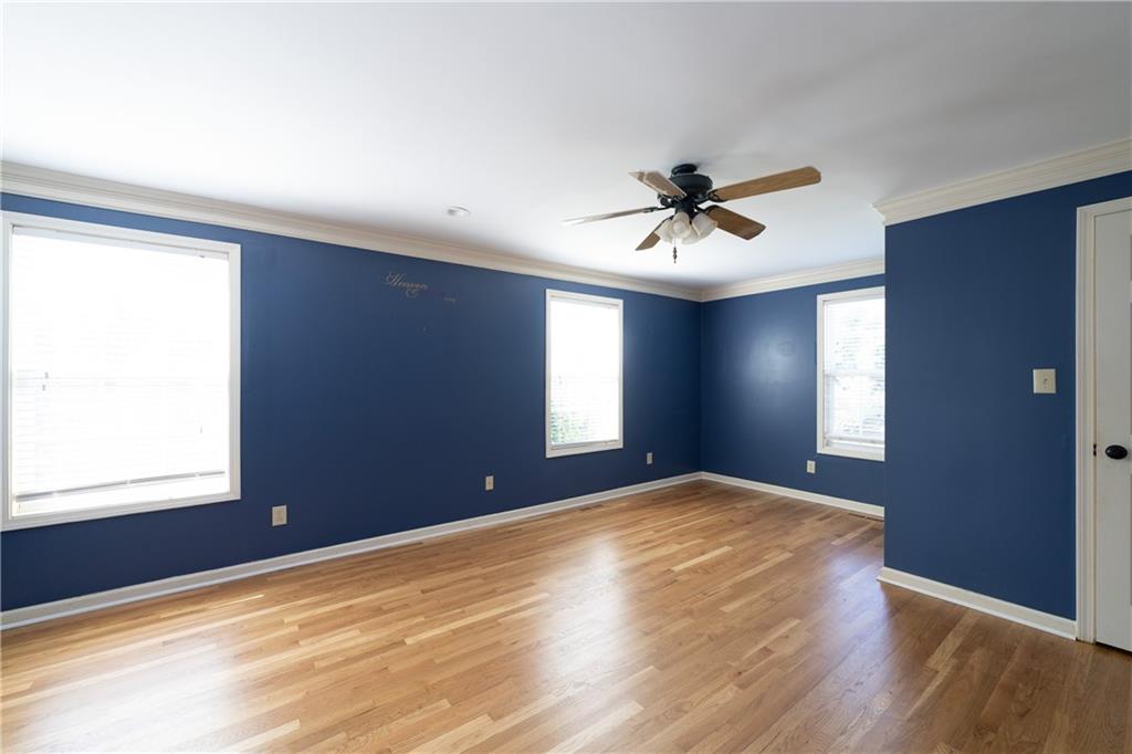 113 Warwick Way Rome, GA 30161 - Photo 28 of 50 a view of empty room with wooden floor and fan