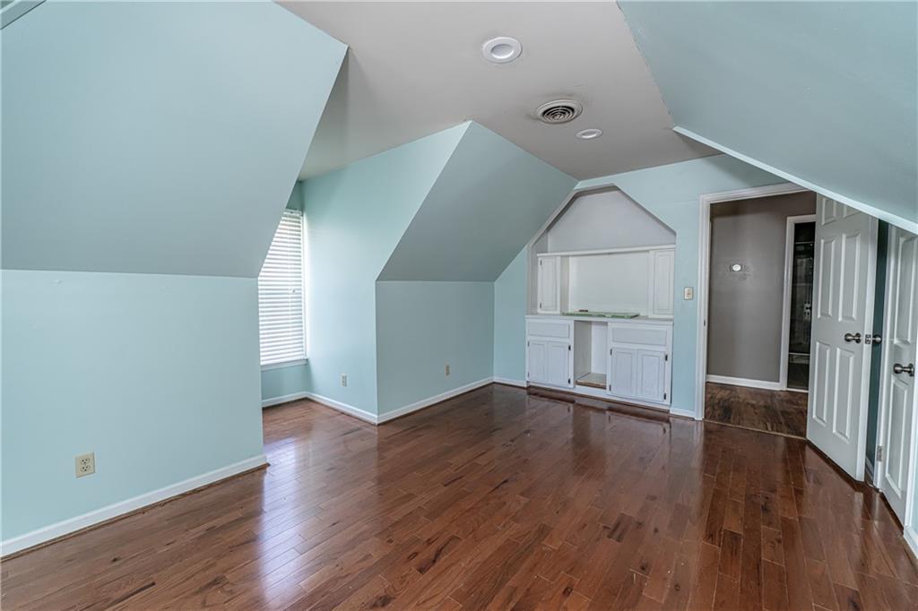 113 Warwick Way Rome, GA 30161 - Photo 37 of 50 an empty room with wooden floor and staircase