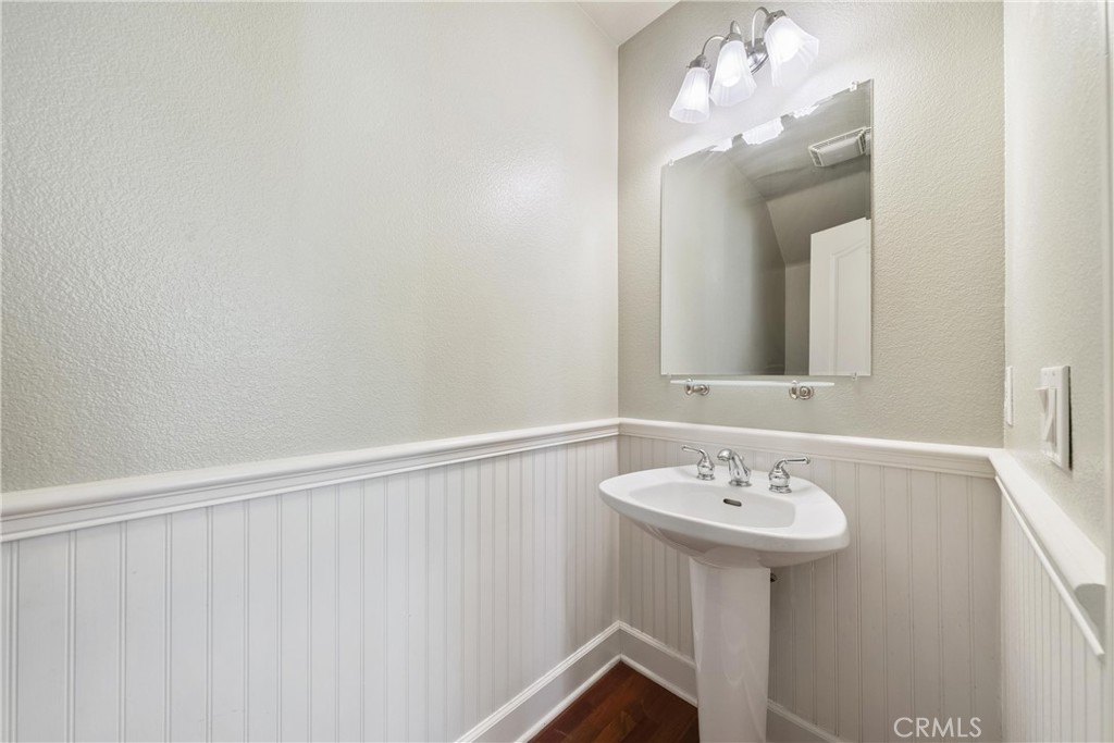5 Second Street Ladera Ranch, CA 92694 - Photo 19 of 36 a bathroom with a sink and a mirror
