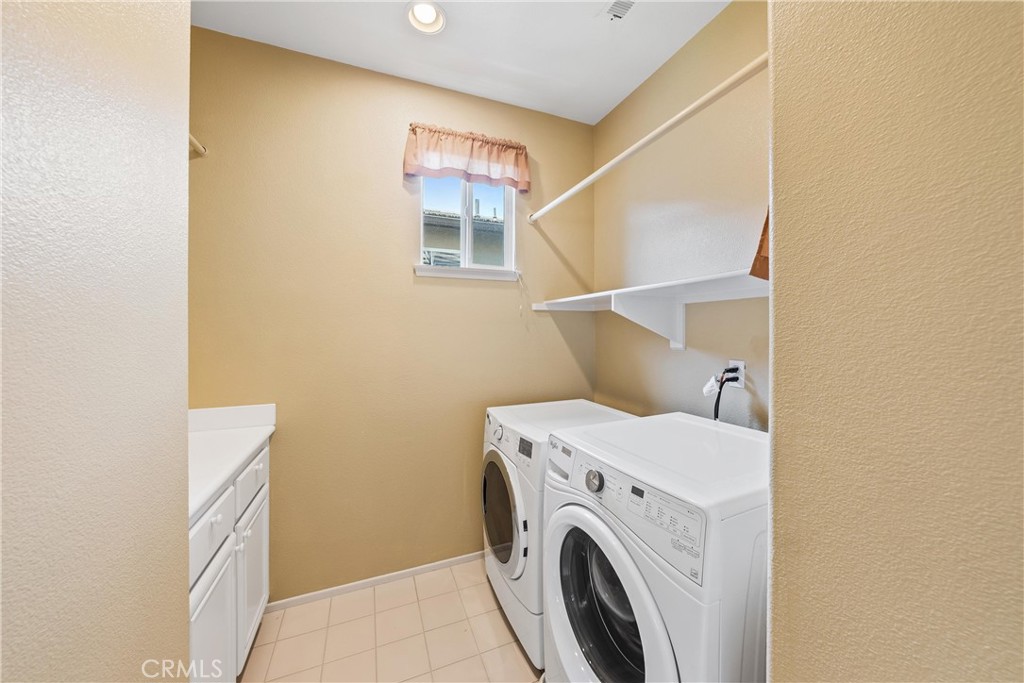 5 Second Street Ladera Ranch, CA 92694 - Photo 20 of 36 a utility room with dryer and washer