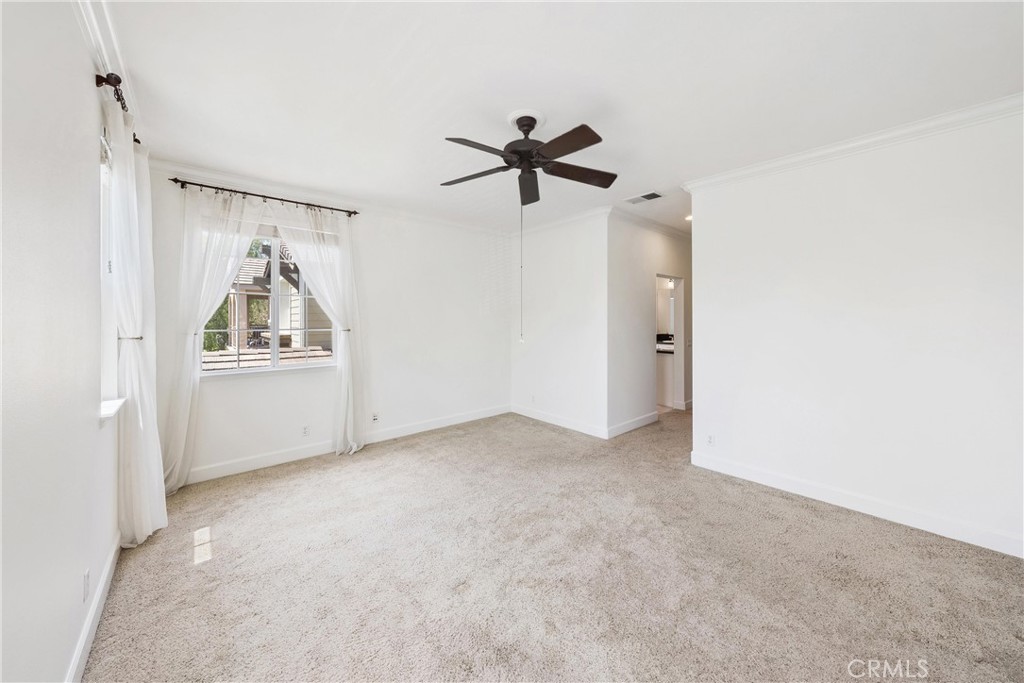 5 Second Street Ladera Ranch, CA 92694 - Photo 30 of 36 a view of a livingroom with a chandelier fan and windows