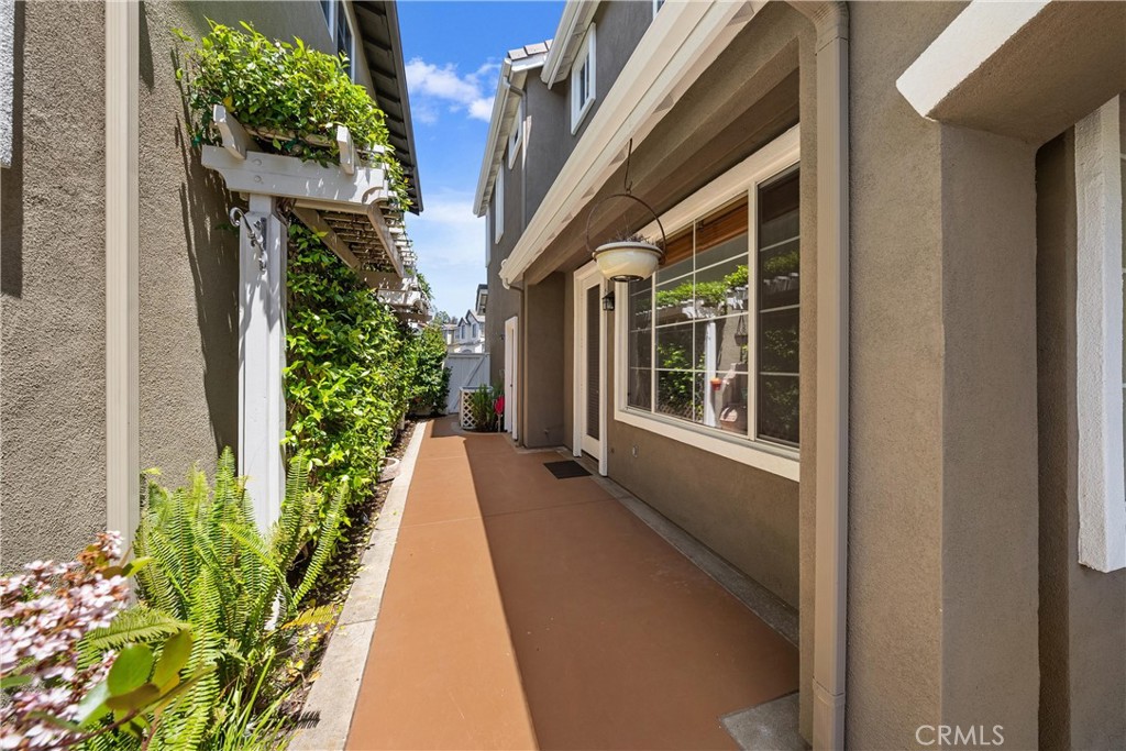 5 Second Street Ladera Ranch, CA 92694 - Photo 6 of 36 a view of a house with potted plants next to a yard