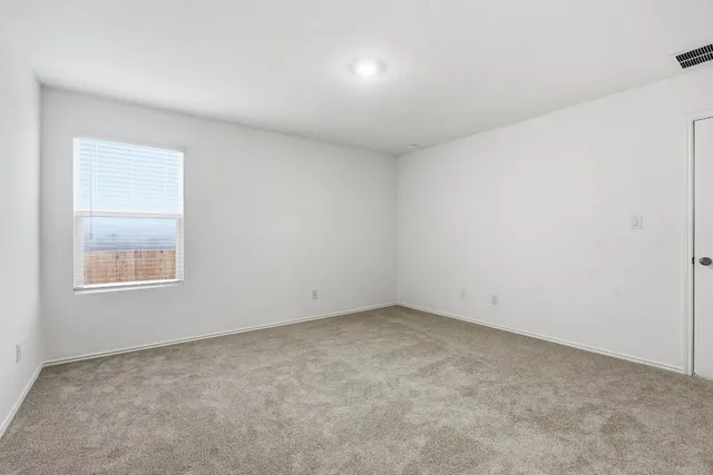 an empty room with a window