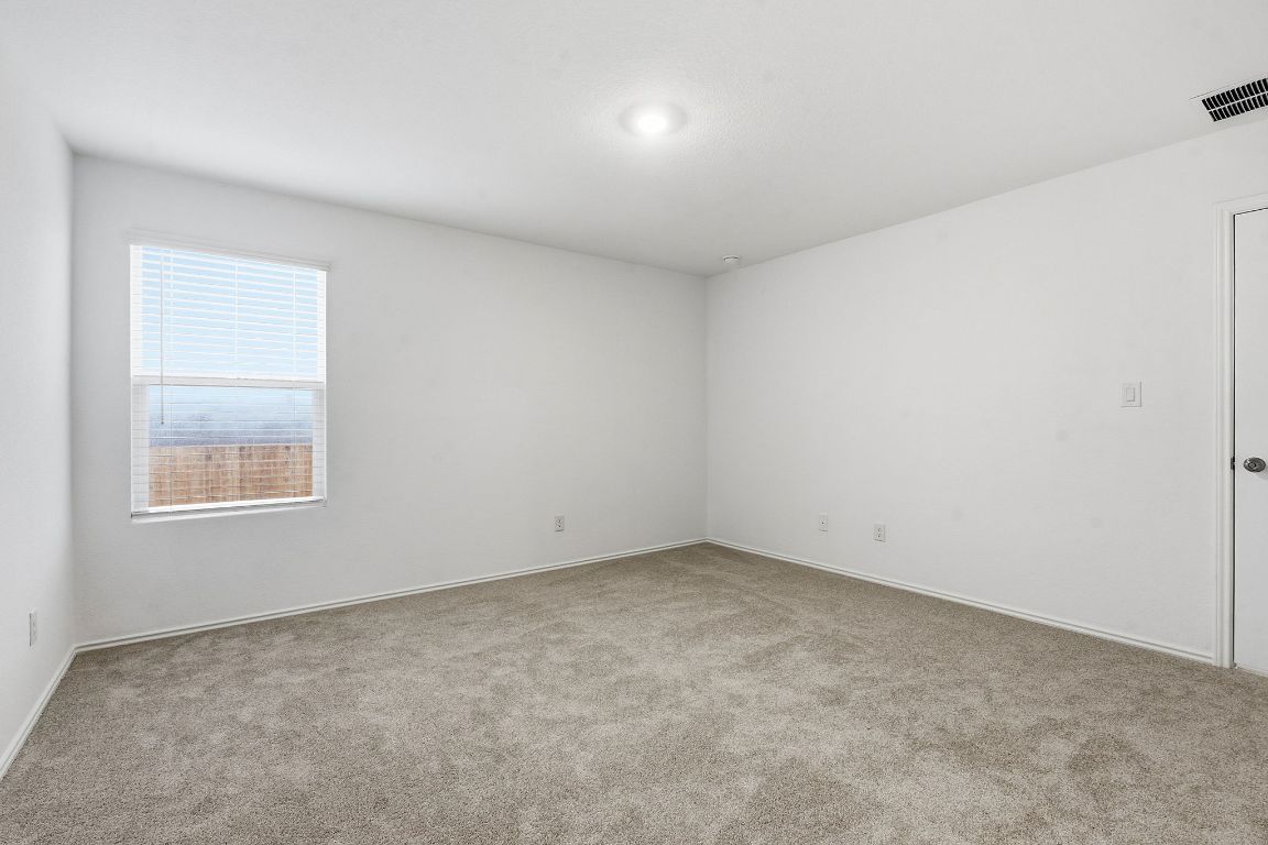 511 Paris Street Maxwell, TX 78656 - Photo 16 of 27 an empty room with a window