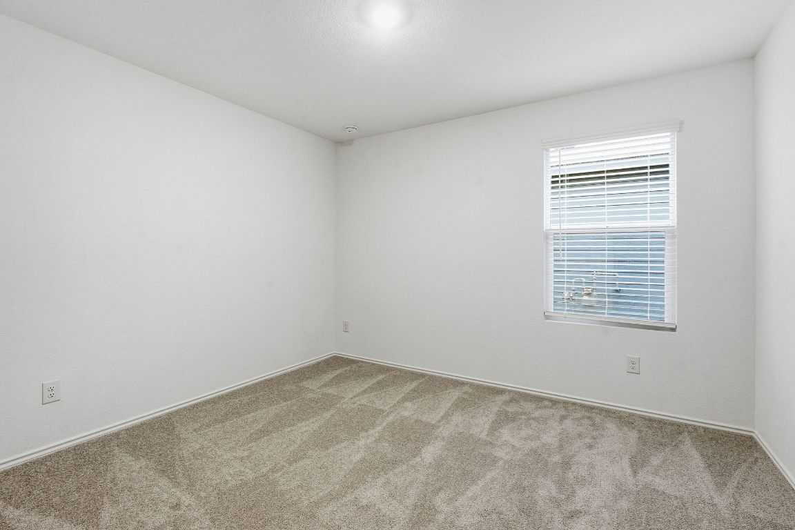 511 Paris Street Maxwell, TX 78656 - Photo 20 of 27 an empty room with a window