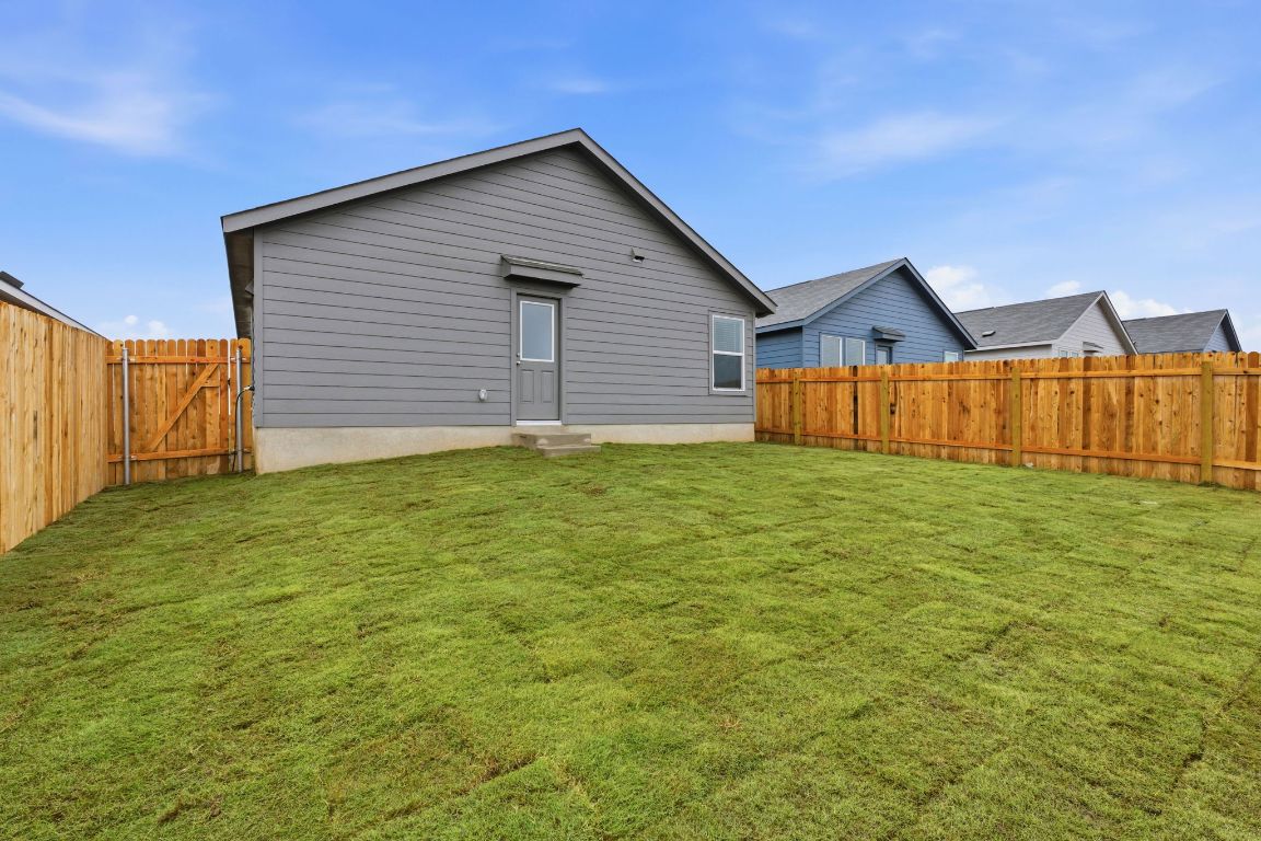 511 Paris Street Maxwell, TX 78656 - Photo 26 of 27 a view of a backyard of the house