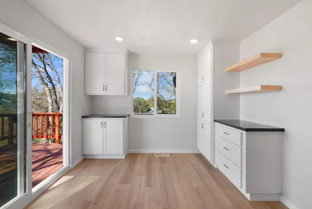 a view of an empty room and window