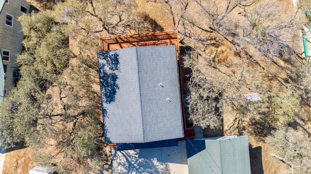 view of balcony with wooden floor and fence