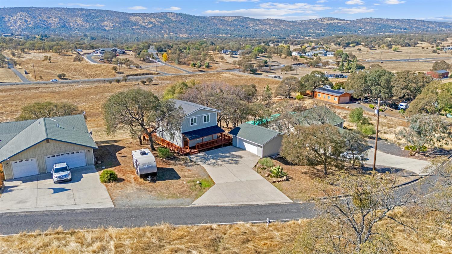 2324 Quail Hill Road Copperopolis, CA 95228 - Photo 31 of 37 an aerial view of residential houses with outdoor space
