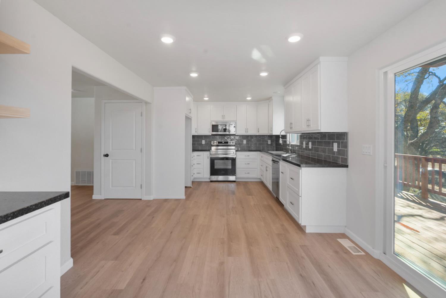 2324 Quail Hill Road Copperopolis, CA 95228 - Photo 10 of 37 a view of kitchen with wooden floor