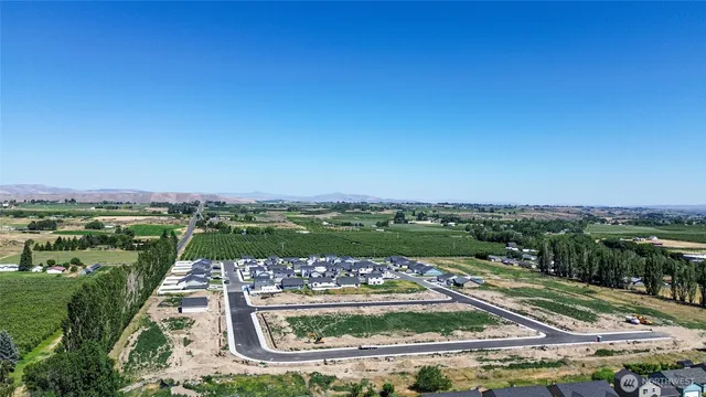 a view of a city with lawn chairs
