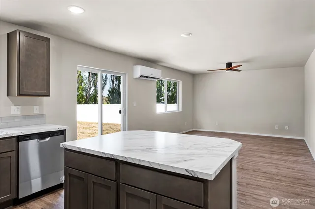 a kitchen with a sink and a window