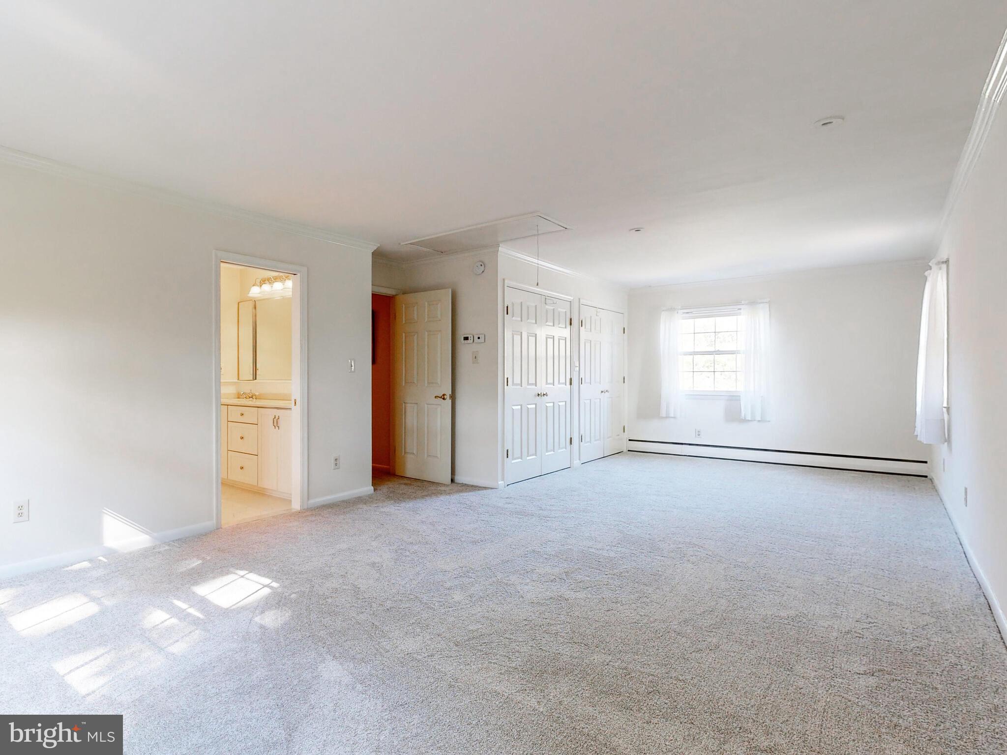 9205 Dunloggin Road Ellicott City, MD 21042 - Photo 23 of 46 Primary Suite with Attached Full Bath