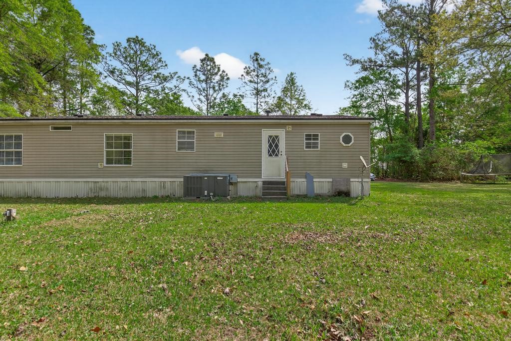 54059 Charles Street Callahan, FL 32011 - Photo 40 of 50 front view of house with a yard