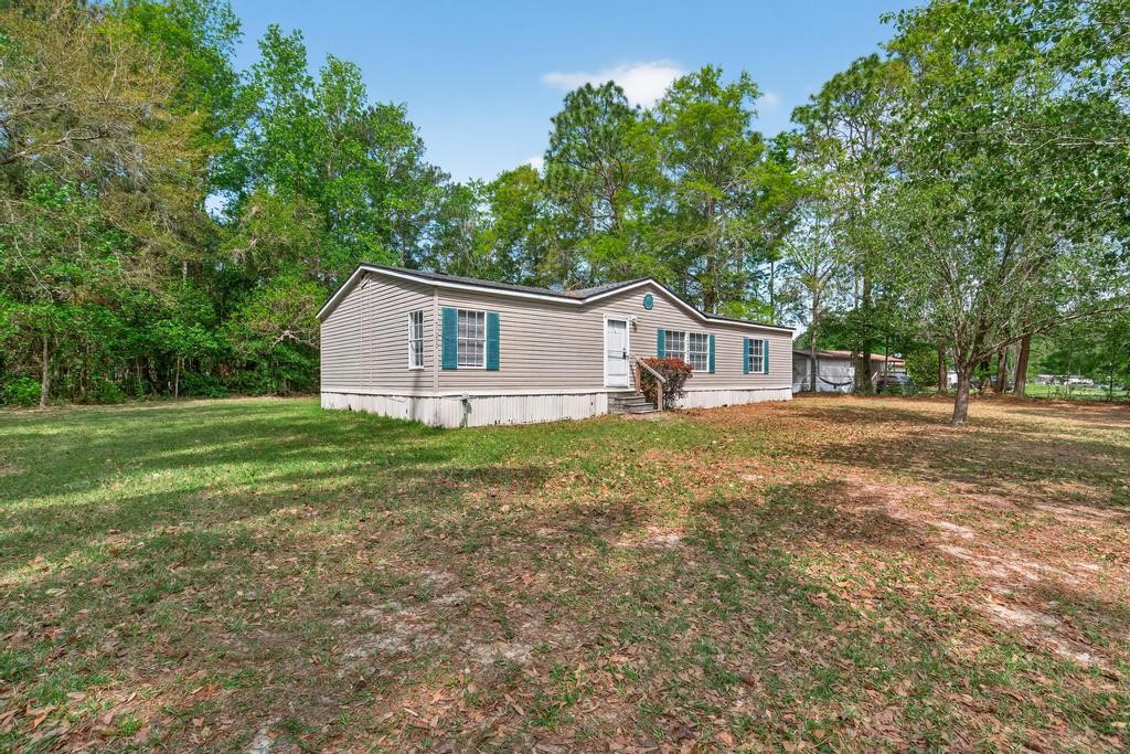 54059 Charles Street Callahan, FL 32011 - Photo 50 of 50 a view of a house with backyard