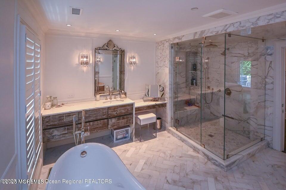 11 Red Oak Drive Spring Lake, NJ 07762 - Photo 12 of 17 a bathroom with a sink mirror and a shower