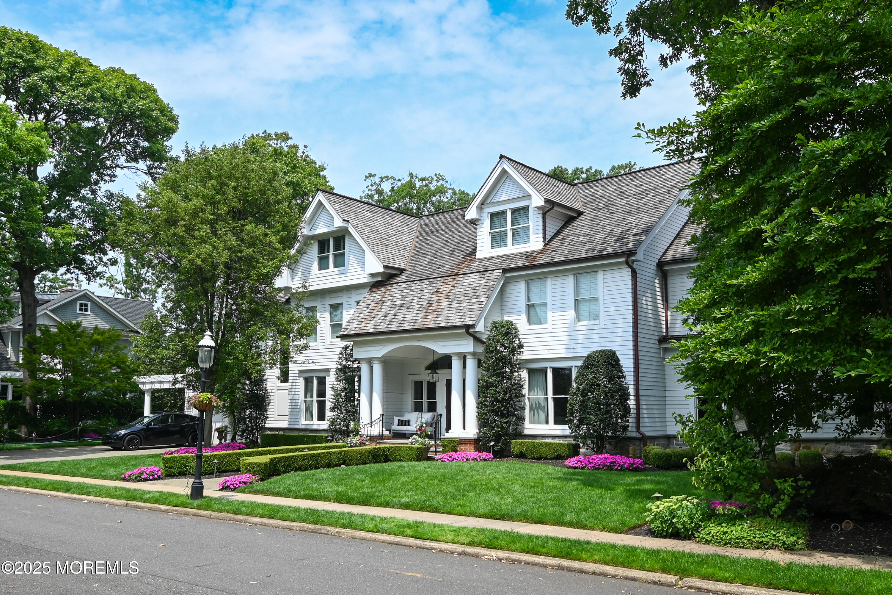 11 Red Oak Drive Spring Lake, NJ 07762 - Photo 13 of 17 a front view of a house with a yard