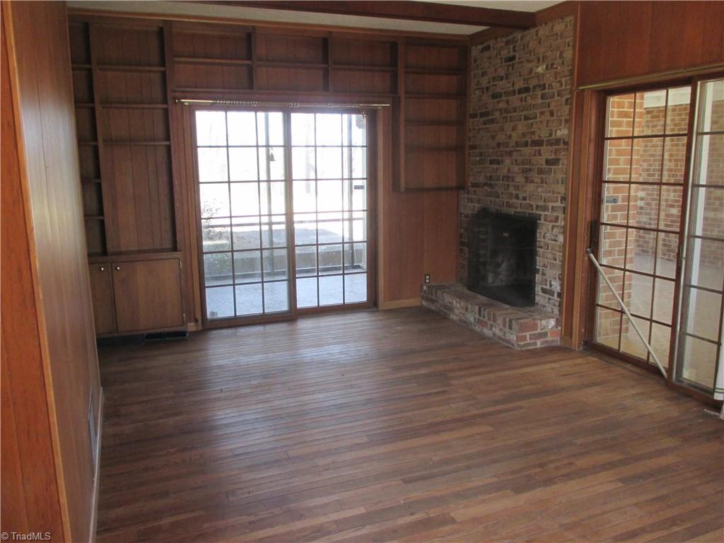 541 Eden Road Stoneville, NC 27048 - Photo 19 of 50 den area with fireplace