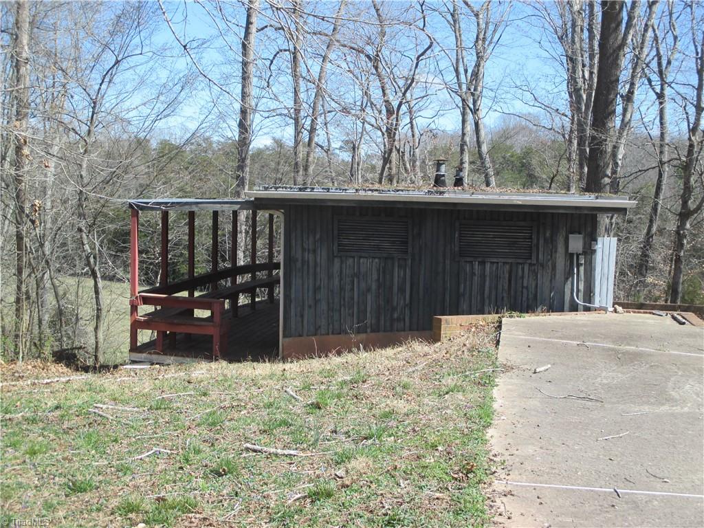 541 Eden Road Stoneville, NC 27048 - Photo 45 of 50 Old pool building- Deck around pool building needs repair.