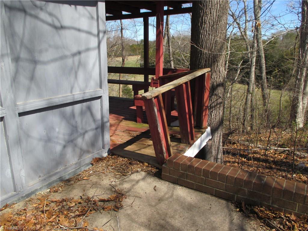 541 Eden Road Stoneville, NC 27048 - Photo 46 of 50 rear deck around pool boulding Warning- would need repair.