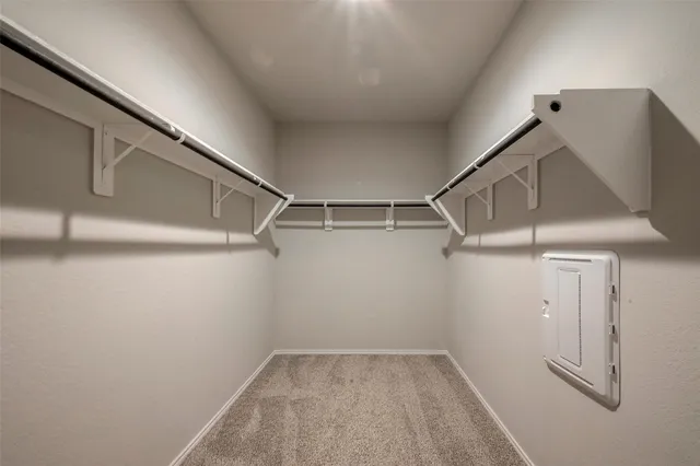 a view of a room with racks on the wall