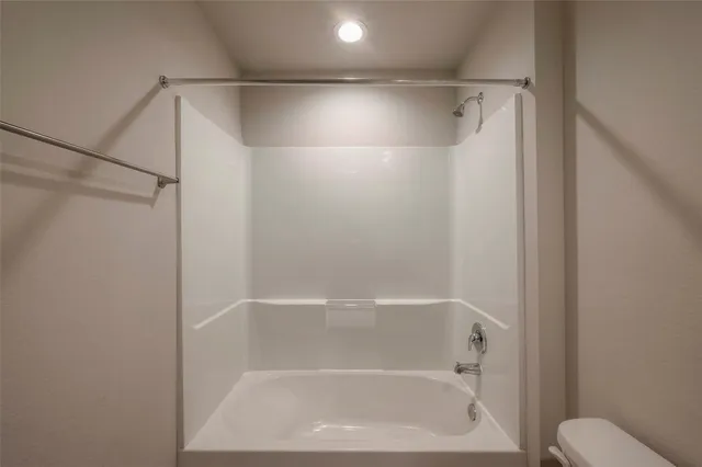 a close view of a bathtub in bathroom