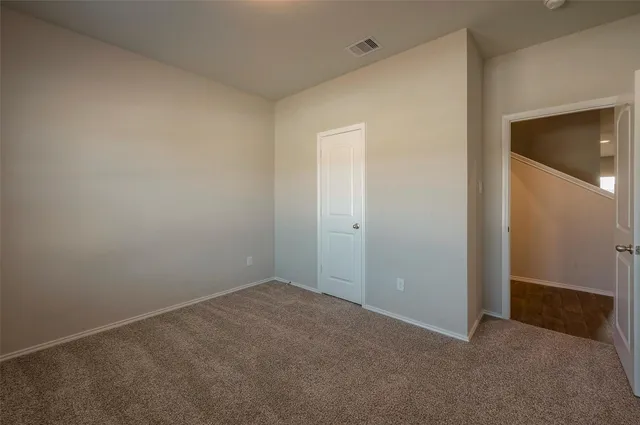 an empty room with closet